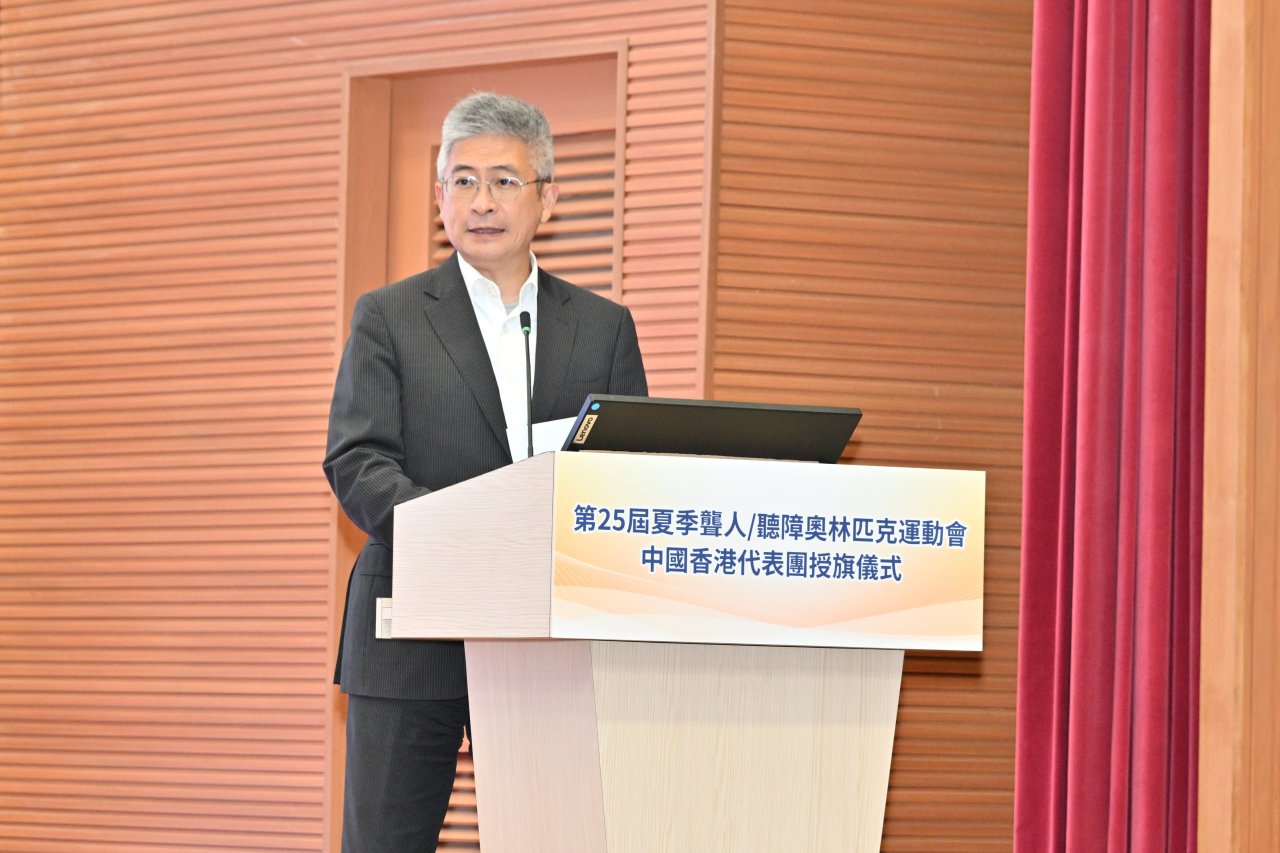 文化體育及旅遊局副局長劉震，JP